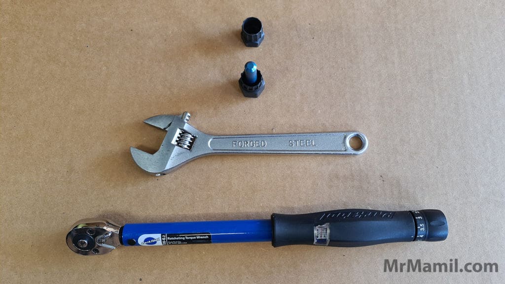 Top to Bottom - Lockring tool for QR, lockring tool for thru axle, adjustable wrench, torque wrench