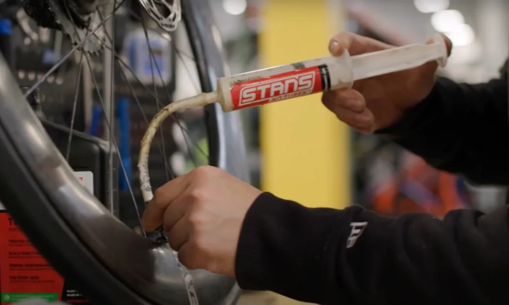 Injecting Tubeless Tire Sealant